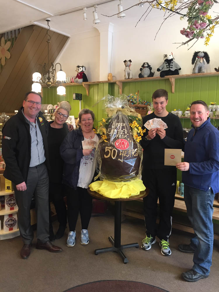 RGV Engineering's MD David Burke (far left) with the lucky winners at the Robert Lewis Chocolate Shop in Salisbury