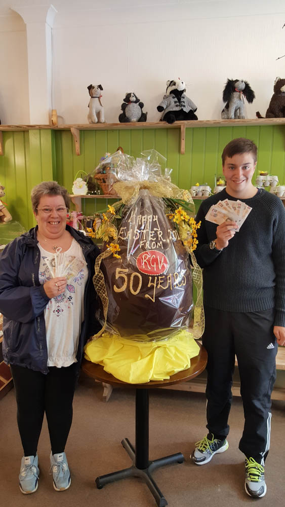Carol & Callum winners of £250 cash and a giant Easter Egg