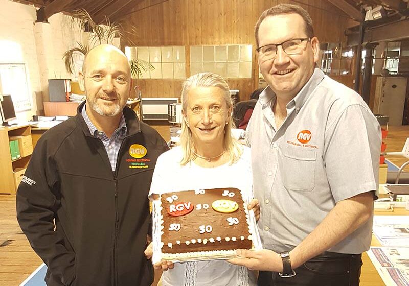 Customer Ann helps RGV celebrate with a cake FI