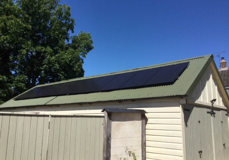 Solar PV panels fitted to an outbuilding roof